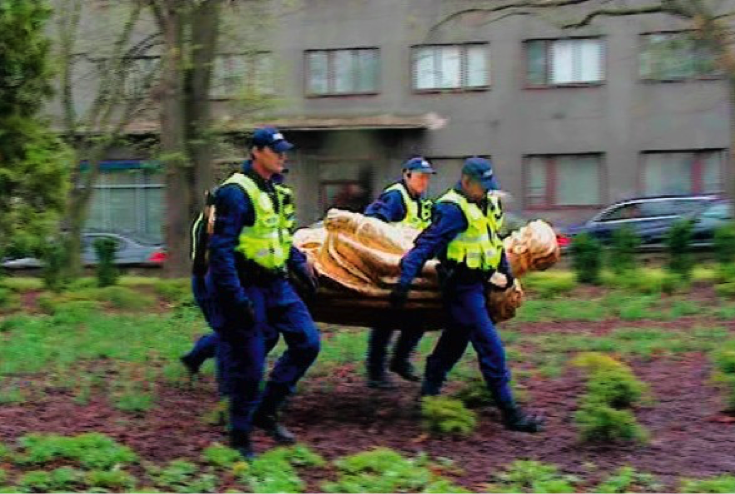 Kristina Norman, After-War, 2009. Estonian police removing Norman’s sculpture. Video still, Erik Norkroos. Image courtesy Kristina Norman. (Archive of Destruction: A Series of Unexpected Incidents 0)