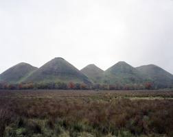 Five Sisters A view of the shale bings in West Calder. In 1976 Latham developed a feasibility study for his Scottish Office placement where he reconceived of the shale bings as process-sculptures (2012) C Print, 105 x 89cm (STUART WHIPPS:  0)