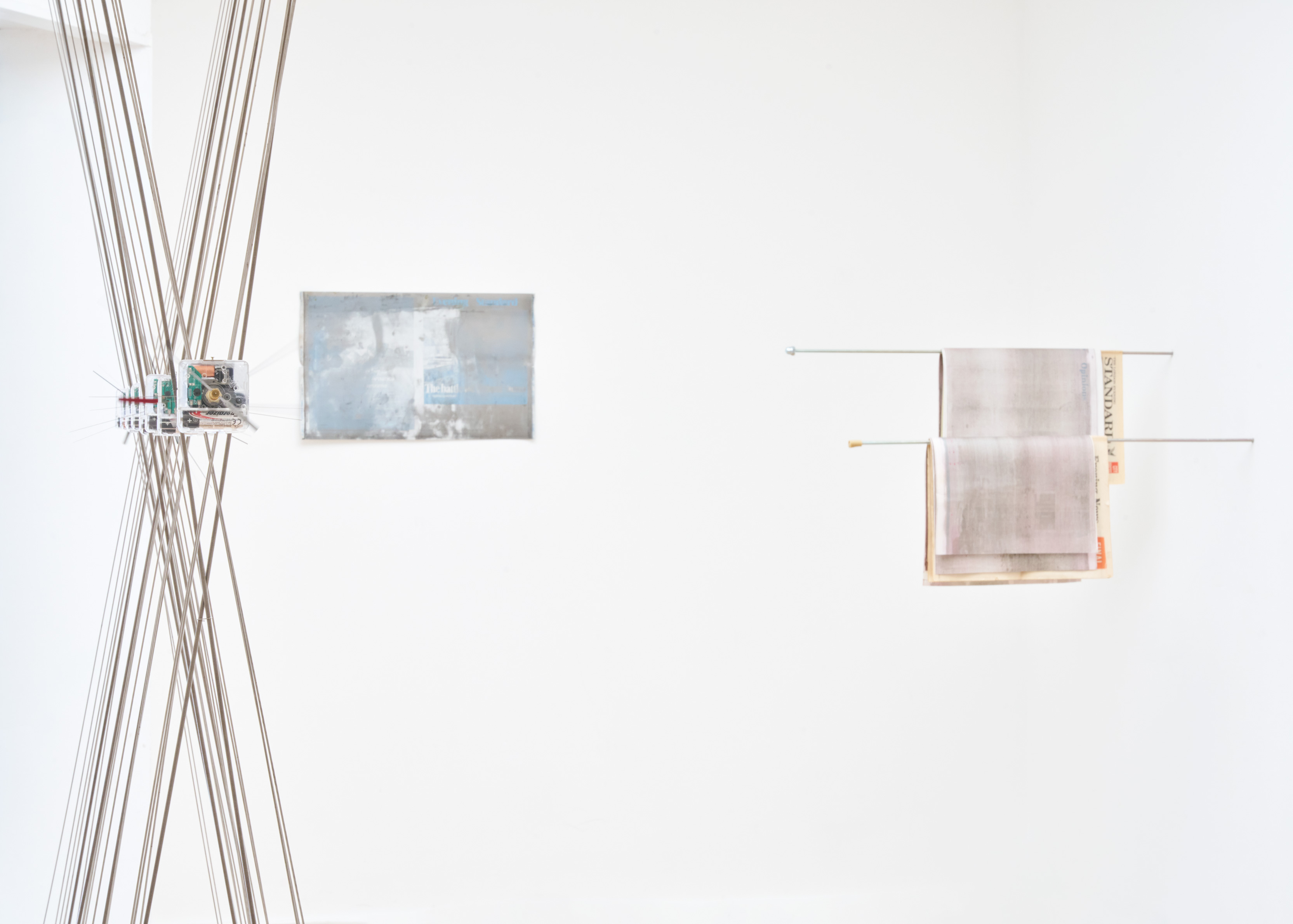 Eloise Hawser, Left to right : Mechanical Coping, Steel, clocks. 2025. 17-09-2024, Found lithographic plate. 2025. Opinions, Steel, newspaper. 2025. Photo : Peter Otto (ELOISE HAWSER: 22)