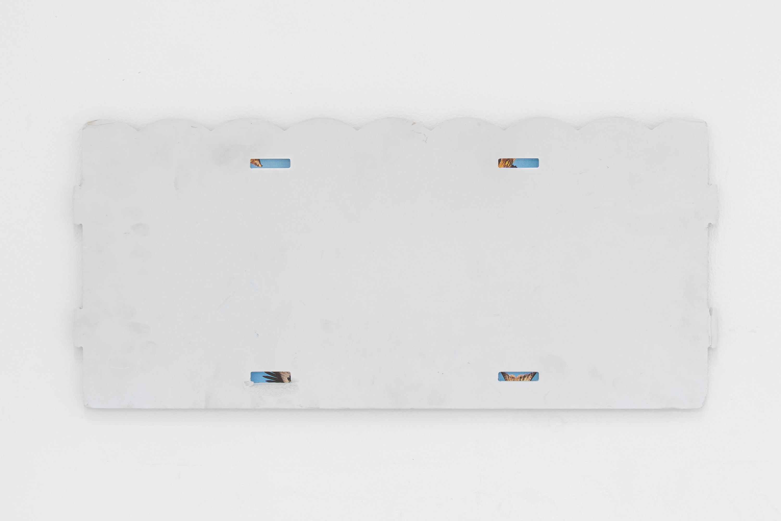Untitled, 2026, cutouts from found book, found object, 21 cm x 48 cm (SØREN RYE:  5)