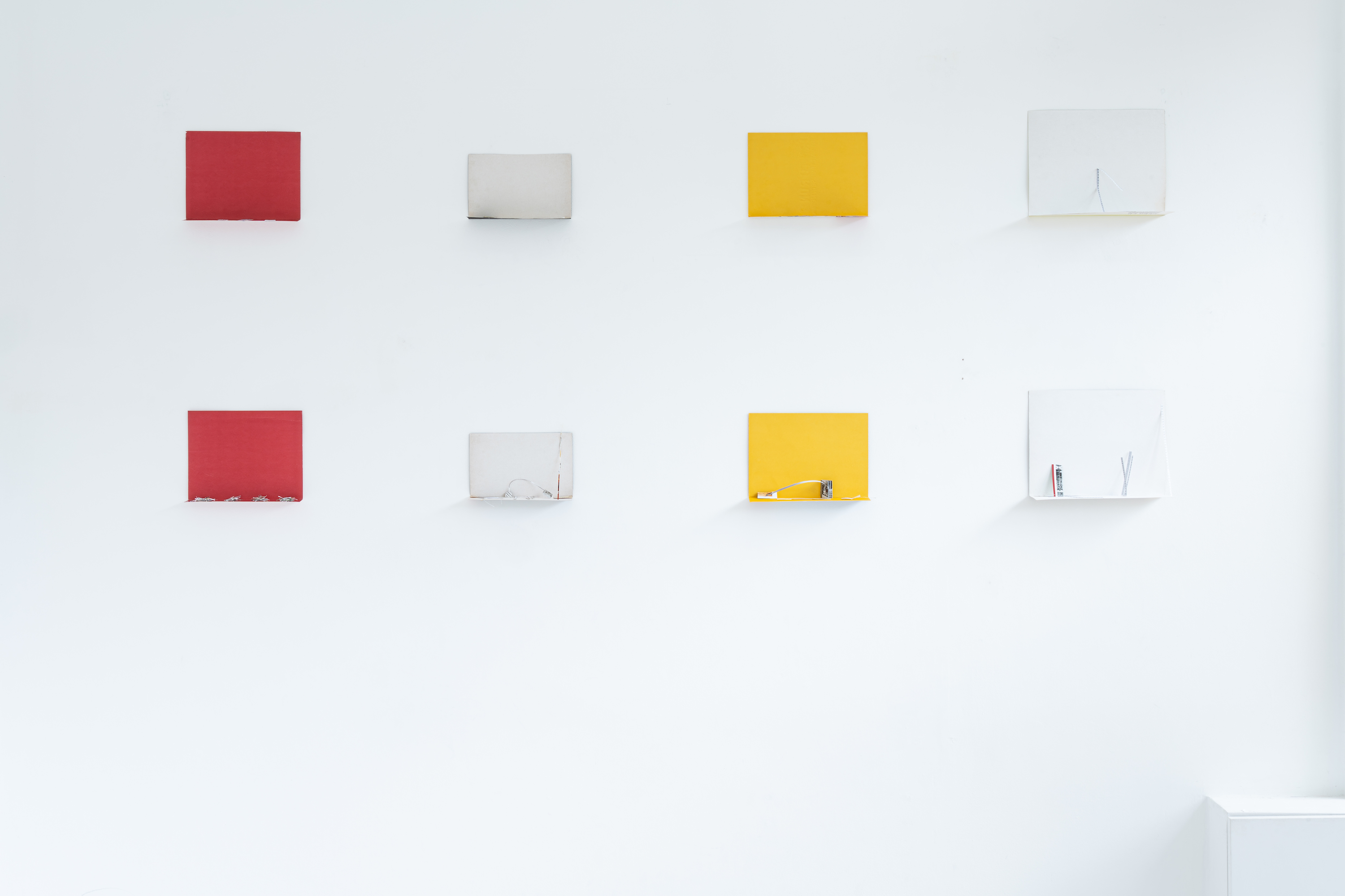 Untitled, 2026, book covers and cutouts from found books, dimensions variable (SØREN RYE:  7)