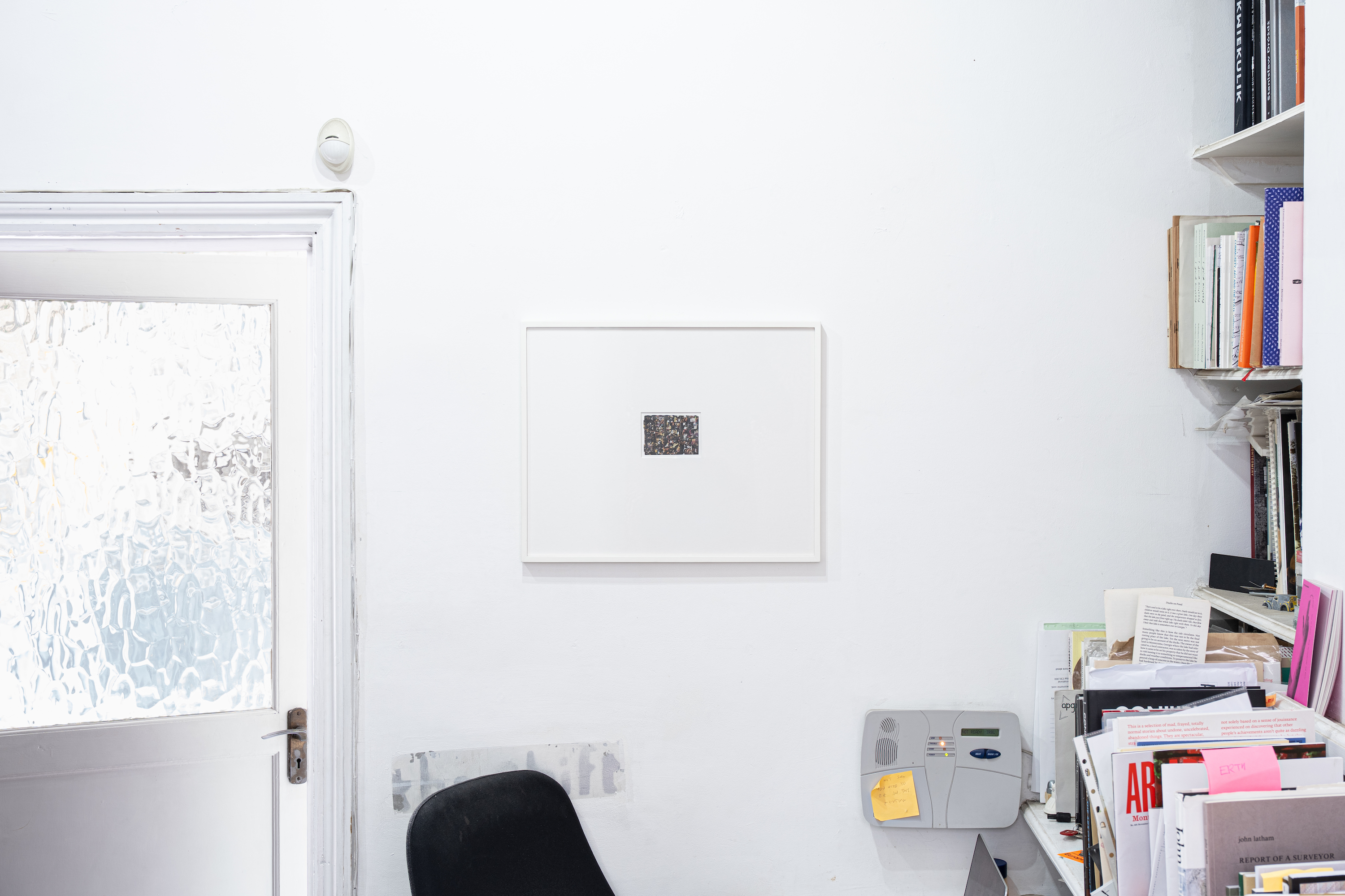 Untitled, 2026, cutout from newspaper, frame: 42 cm x 51 cm, work: 7 cm x 9 cm (SØREN RYE:  18)